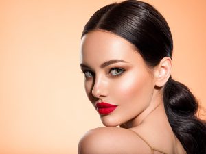 woman with smooth skin and red lipstick